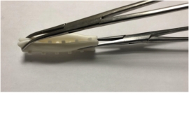 Forma de plegado en implante de endoprótesis veterinaria